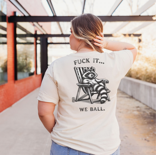 Men's & Women's sun-bathing raccoon graphic tee